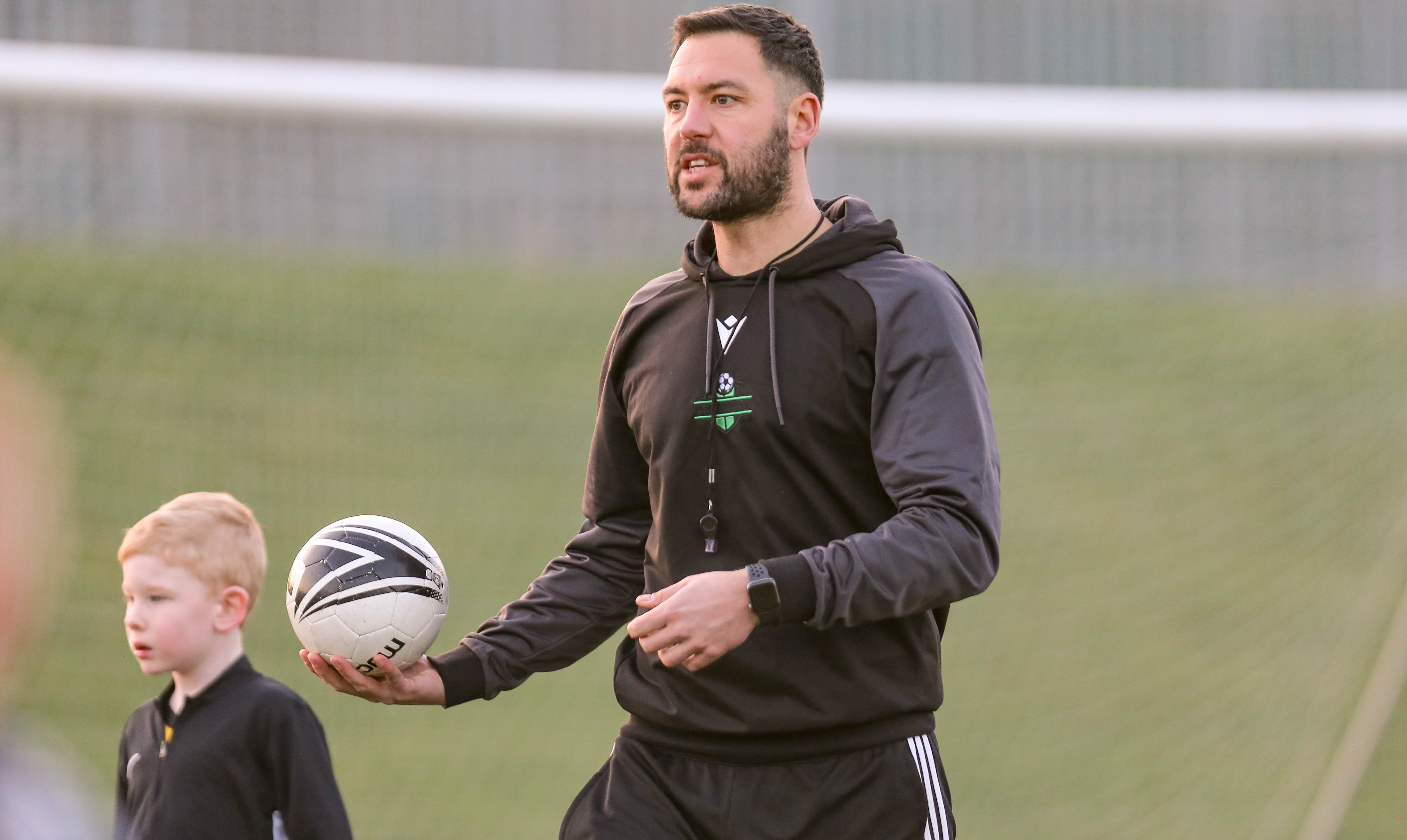 Fusion FC coach on the training pitch